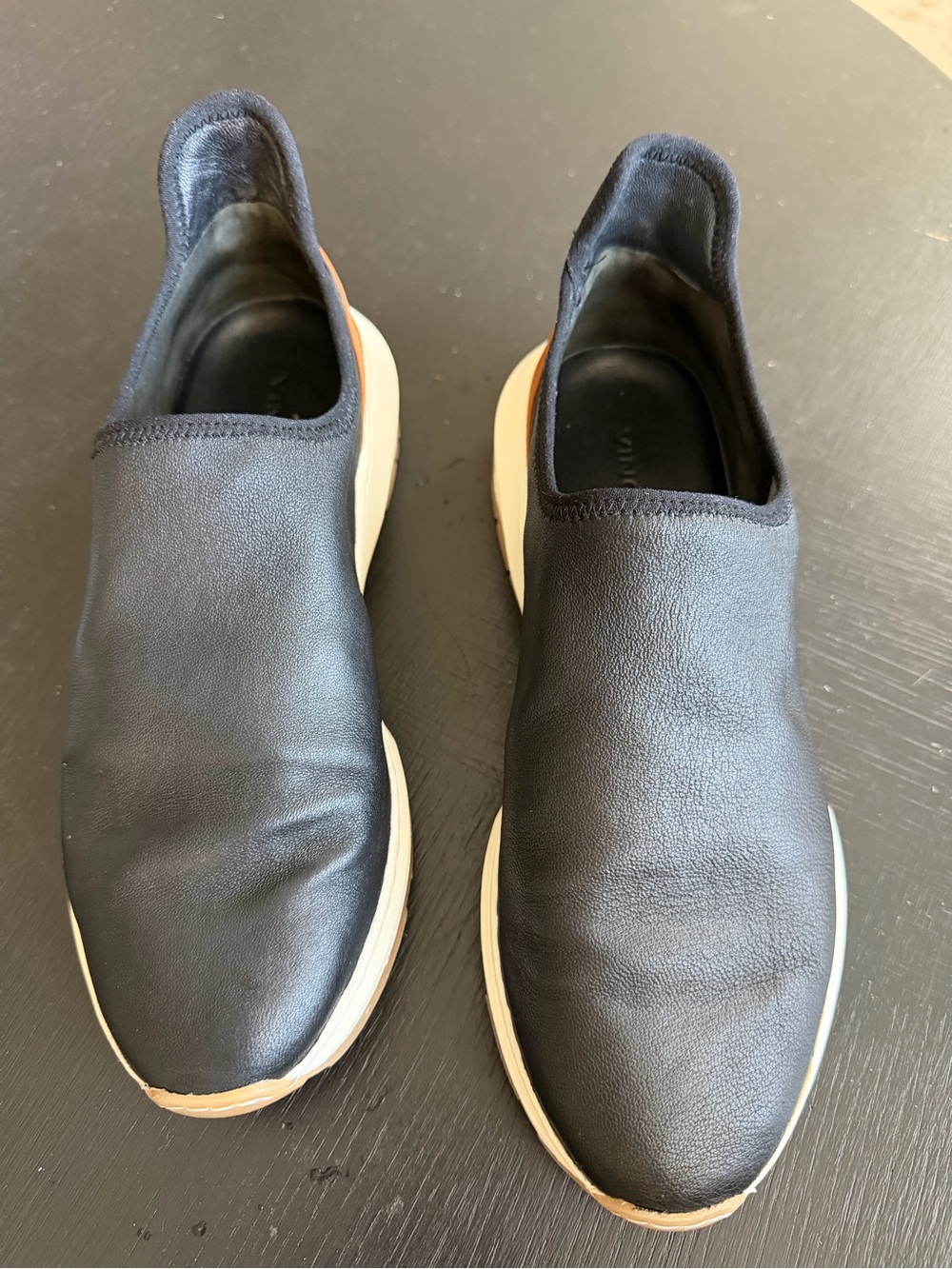Vince Women’s Black Slip-On Leather Sneakers with White Sole